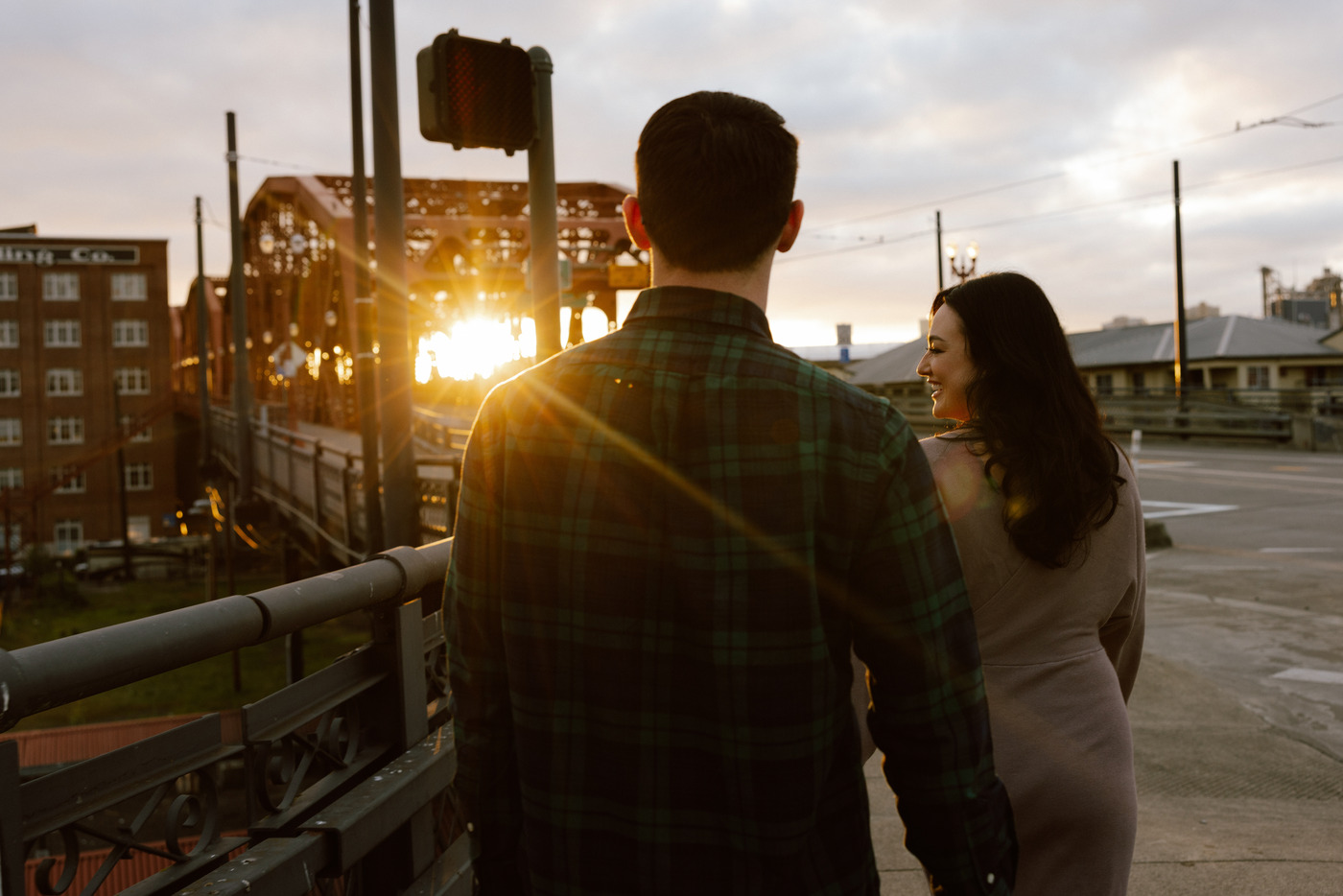 Couple walking on the Broadway Bridge in Portland